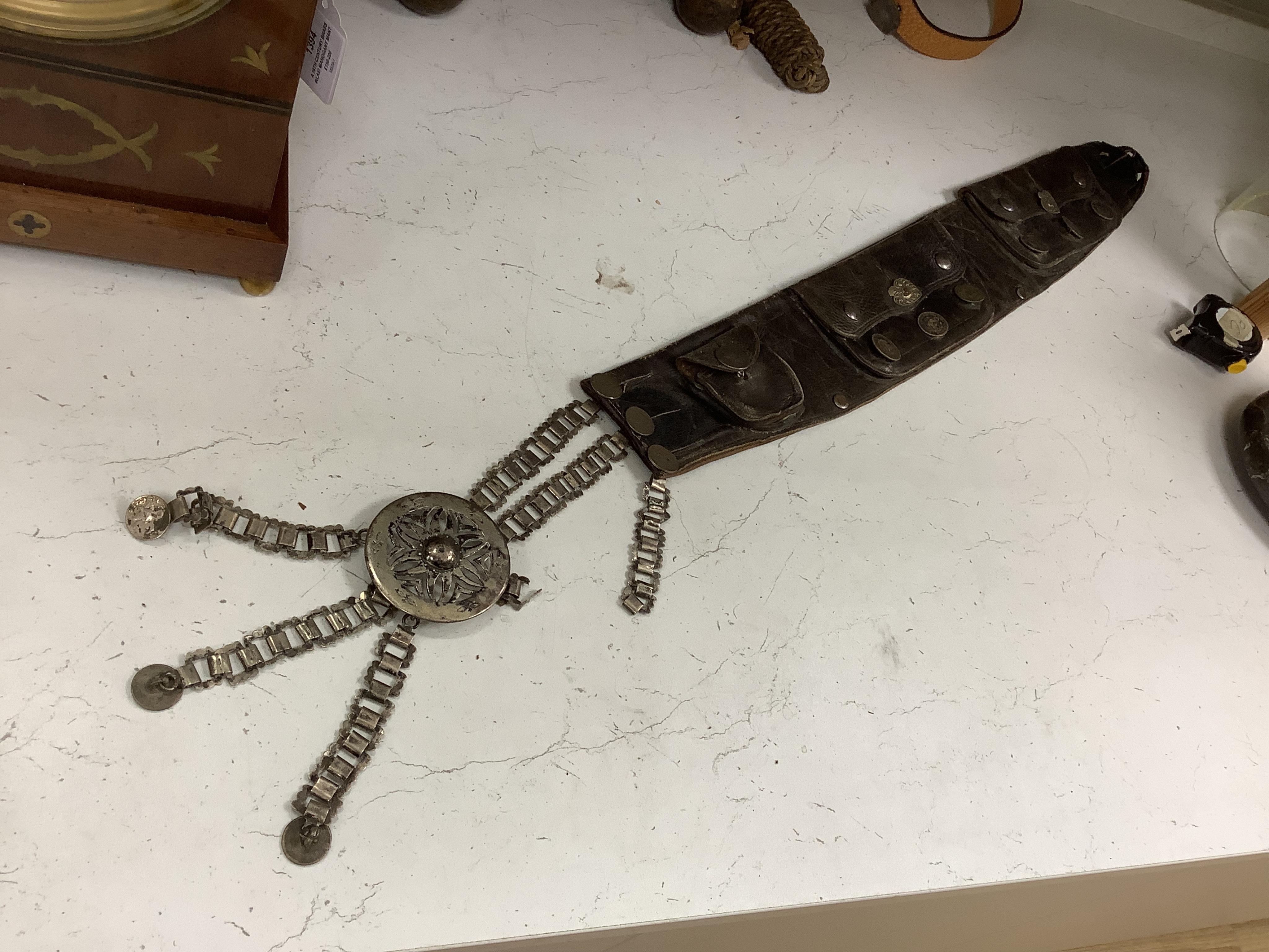 A group of Argentinian Gaucho spurs, bolas, bull whip, daggers and hanger, Longest 100cm